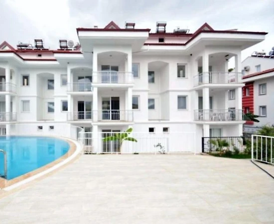 Ölüdeniz Hisarönü'nde Merkezi Konumda, Ortak Havuzlu, 2+1 Apart - 1