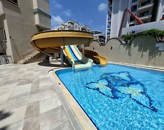 Alanya Güllerpınarı'nda Denize Yakın, Ortak Havuzlu, 3 Kişilik Suit - 1