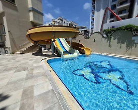 Alanya Güllerpınarı'nda Merkezi Konumda, Ortak Havuzlu, 1+1 Suit - 3