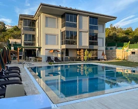 Kuşadası Bayraklıdede'de Modern Tasarımlı, Ortak Havuzlu, 1+1 Kiralık Daire - 2