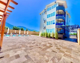 Fethiye Menteşeoğlu'nda Minimalist Tasarımlı, Ortak Havuzlu, Konforlu Daire - 1