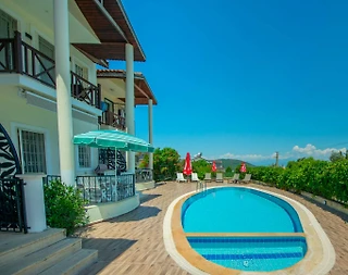 Fethiye Ölüdeniz'de Doğa İle İç İçe, Ortak Havuzlu, Konforlu Villa - 5