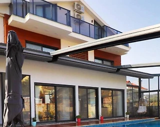 Fethiye Ölüdeniz'de Merkezi Konumda, Isıtmalı Havuzlu, Kiralık Villa - 2