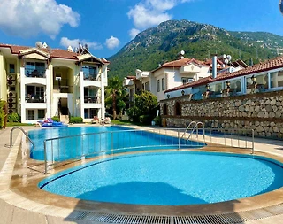 Fethiye Ölüdeniz'de Merkezi Konumda, Ortak Havuzlu, Konforlu Suit - 1