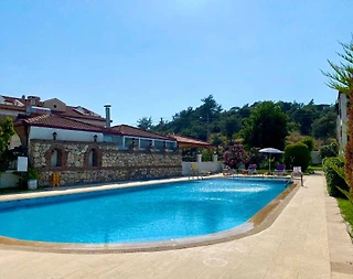 Fethiye Ölüdeniz'de Merkezi Konumda, Ortak Havuzlu, Konforlu Suit - 3