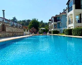 Fethiye Ölüdeniz'de Merkezi Konumda, Ortak Havuzlu, Konforlu Suit - 4