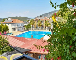 Fethiye Ölüdeniz'de Tesis İçerisinde, Ortak Havuzlu, Konforlu Suit - 4