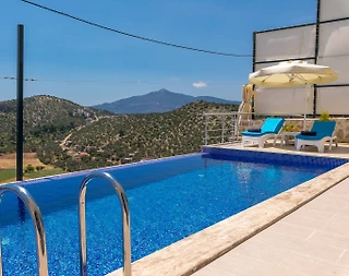 Kaş Bezirgan'da Dağ Manzaralı, Özel Havuzlu, Şık Kiralık Villa  - 2