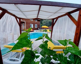 Kalkan Üzümlü'de Ahşap Tasarıma Sahip, Özel Havuzlu, Konforlu Villa - 5