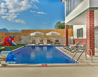 Kaş Bezirgan'da Geniş Bahçeli, Özel Havuzlu, Çocuk Oyun Alanlı Villa - 4