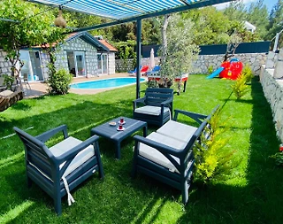 Kaş Üzümlü'de Taş Mimarili, Özel Havuzlu, Çocuk Oyun Alanlı Villa - 1