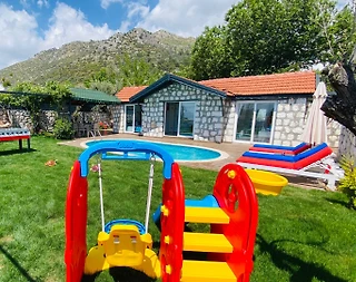 Kaş Üzümlü'de Taş Mimarili, Özel Havuzlu, Çocuk Oyun Alanlı Villa - 2