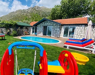 Kaş Üzümlü'de Taş Mimarili, Özel Havuzlu, Çocuk Oyun Alanlı Villa - 4