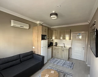 Fethiye Ölüdeniz'de Merkezi Konumda, Ortak Havuzlu, Konforlu Apart - 5